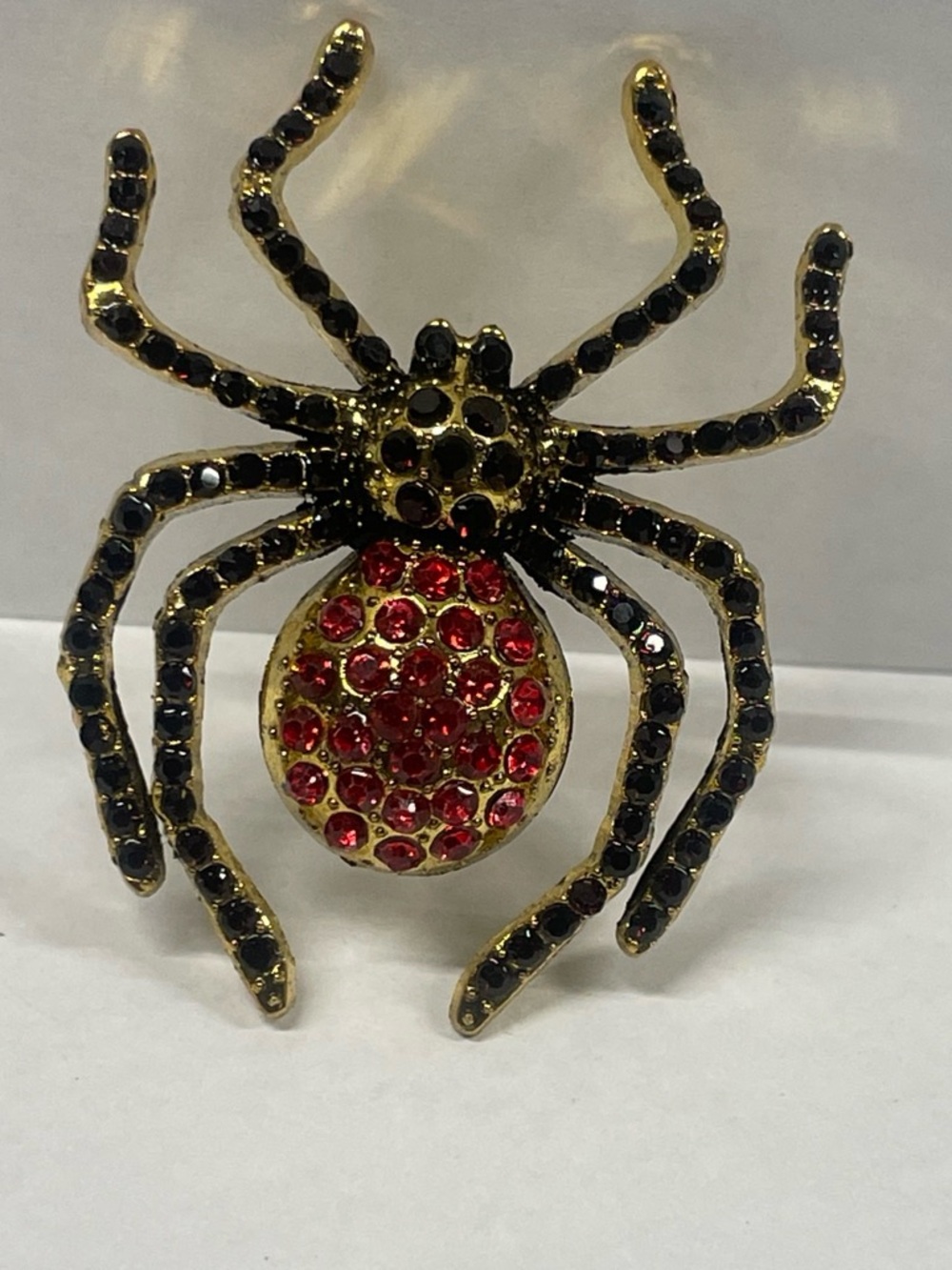 Gold-Tone Spider Brooch with Black and Red Crystal Accents